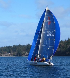 Joe's 11 meter sailboat, sailing in Olympia. spinnaker, mainsail, budd inlet, sailing race